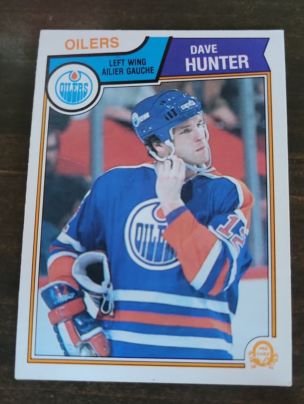 1983/84 OPC Dave Hunter Edmonton Oilers Vintage Hockey Card - Blue & Orange